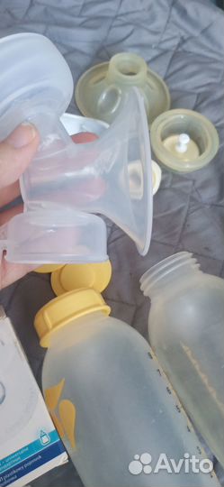 Молокоотсос medela электрический