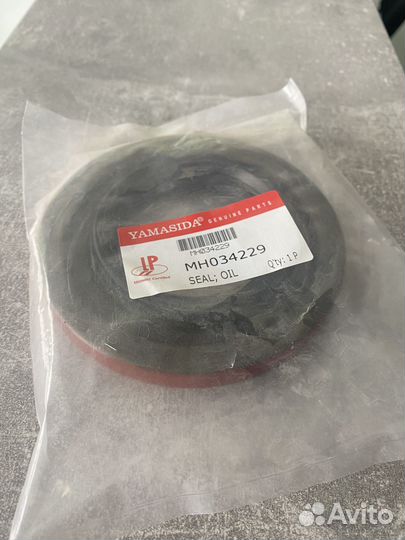 Сальник хвостовика 70*135*14*18.5 MH034229 fuso Y