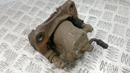 Суппорт тормозной задний левый toyota RAV 4 ZSA3