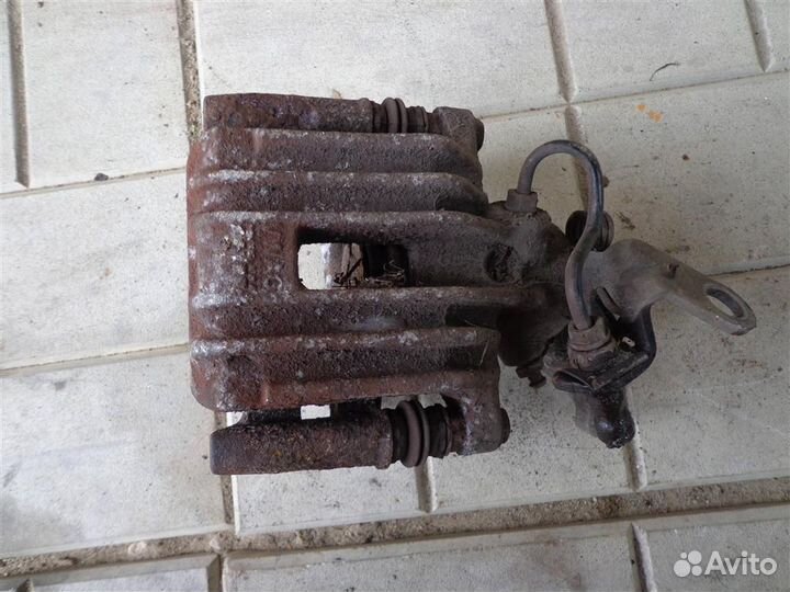 Суппорт задний левый Skoda Octavia A5 1Z