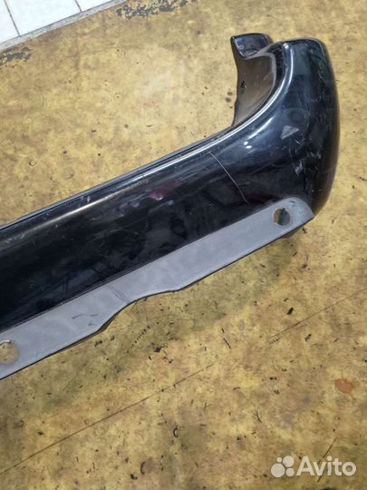 Бампер задний Додж караван Вояджер 07г