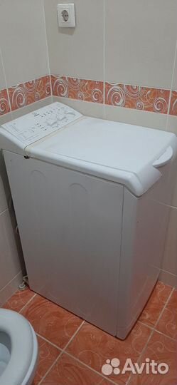 Стиральная машина с вертикальной загрузкой