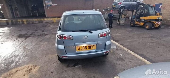 Накладка двери (крышки) багажника Mazda 2 DY рест