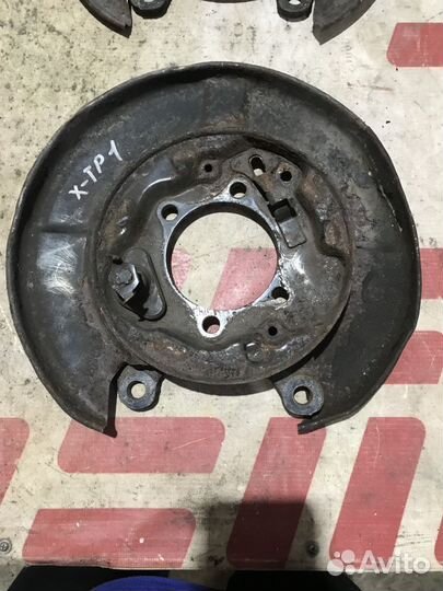 Щит опорный задний Nissan X-Trail II (2007—2011)