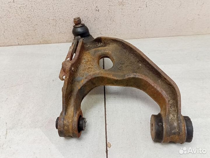 Рычаг задний верхний левый 20252FG010