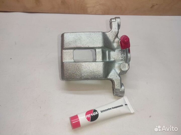 Суппорт тормозной задний лев. nissan X-trail