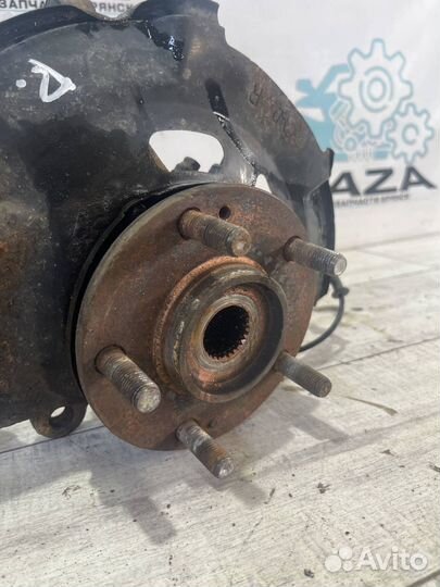 Кулак передний правый Kia Cerato 3