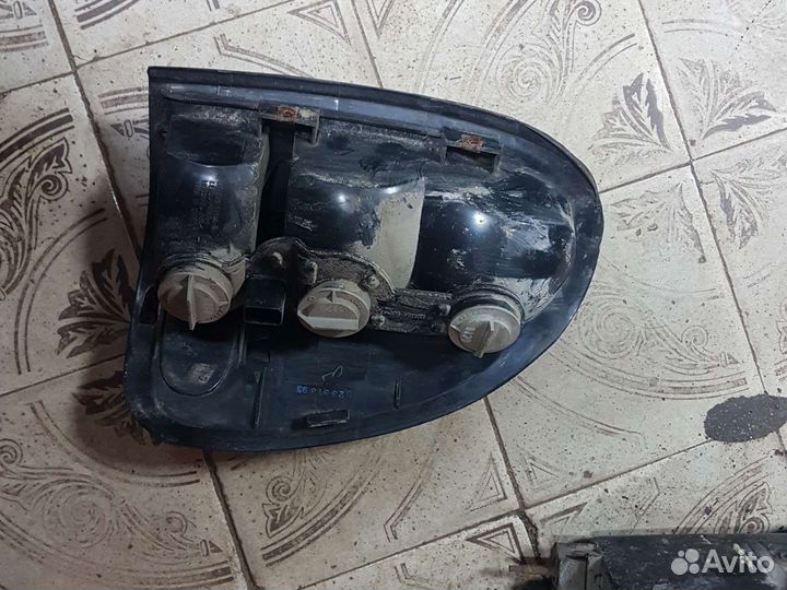 Фонарь задний левый для Chrysler Voyager USA