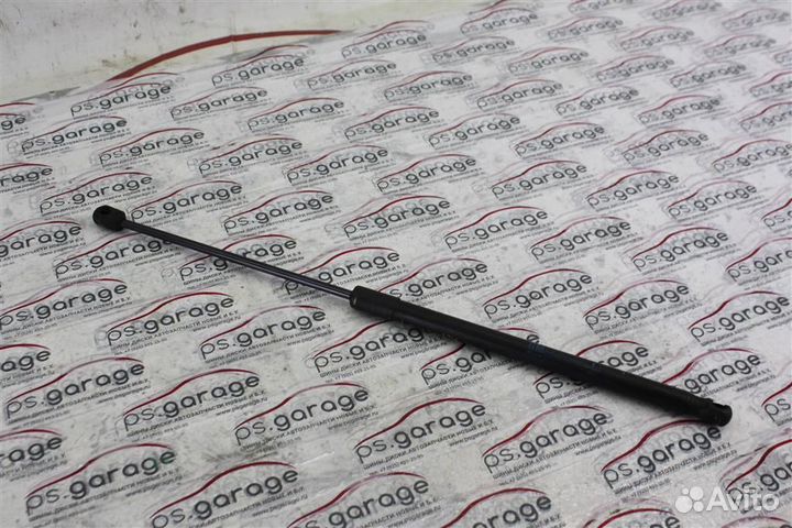 Амортизатор капота Opel Astra H