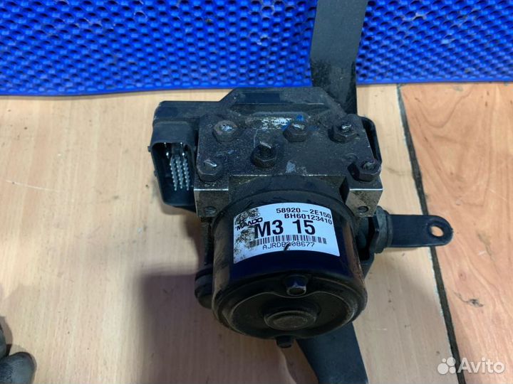 Блок управления тормозами/насос ABS Kia Sportage