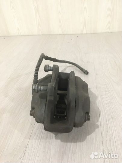 Суппорт тормозной передний левый Mercedes Benz