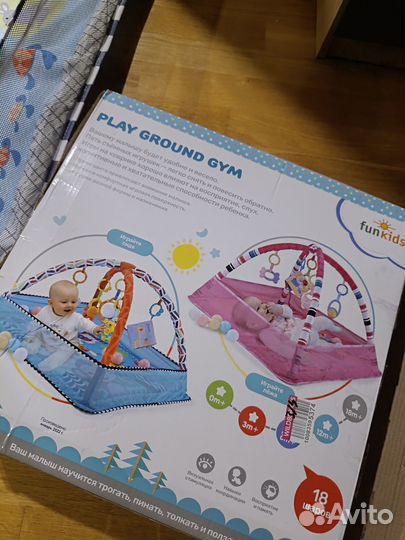 Развивающий коврик с дугами и игрушками