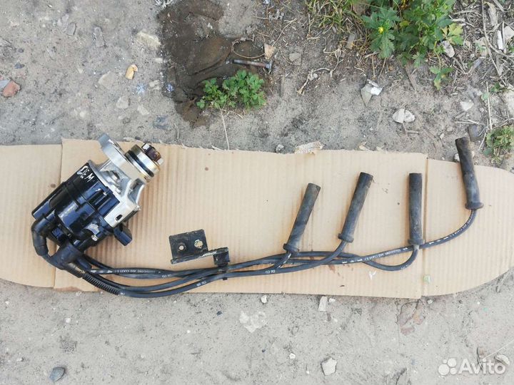 Трамблёр Мазда Демио 1