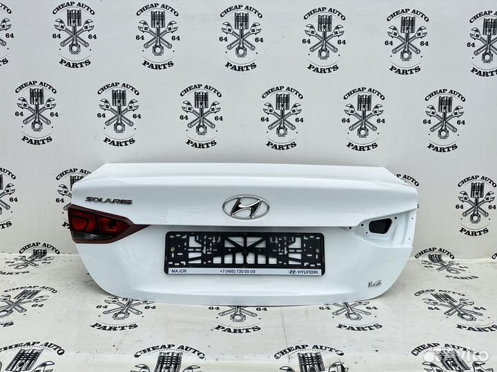 Белая крышка багажника Hyundai Solaris 2 Оригинал