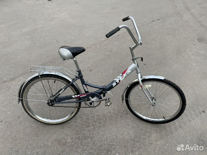 Stels Pilot 710 24 складной дорожный велосипед