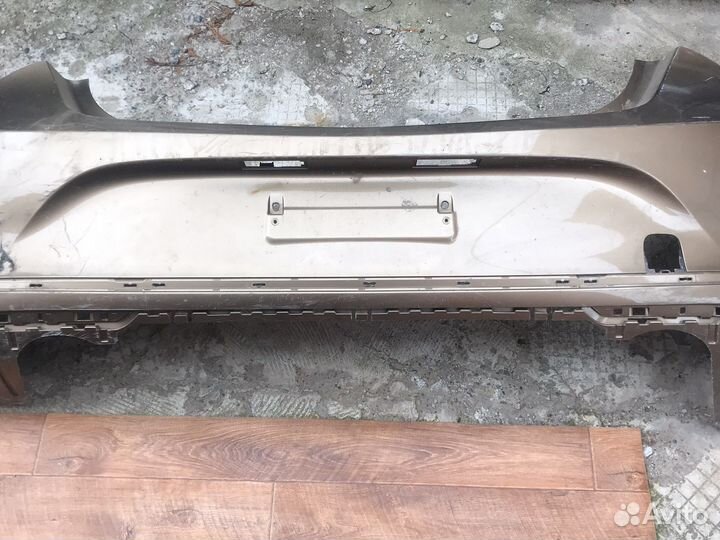 Задний бампер Opel Astra J