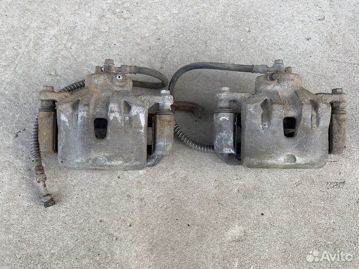 Суппорт передний левый Kia Cerato 3