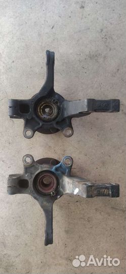 Кулак поворотный левый правый Nissan Note E11