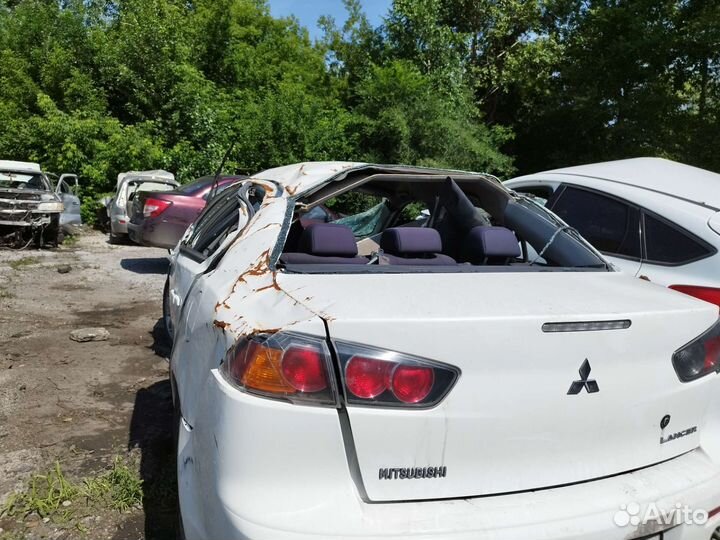 В Разбор mitsubishi lancer 1.6 2013 год