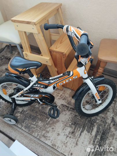 Детский четырёхколесный велосипед