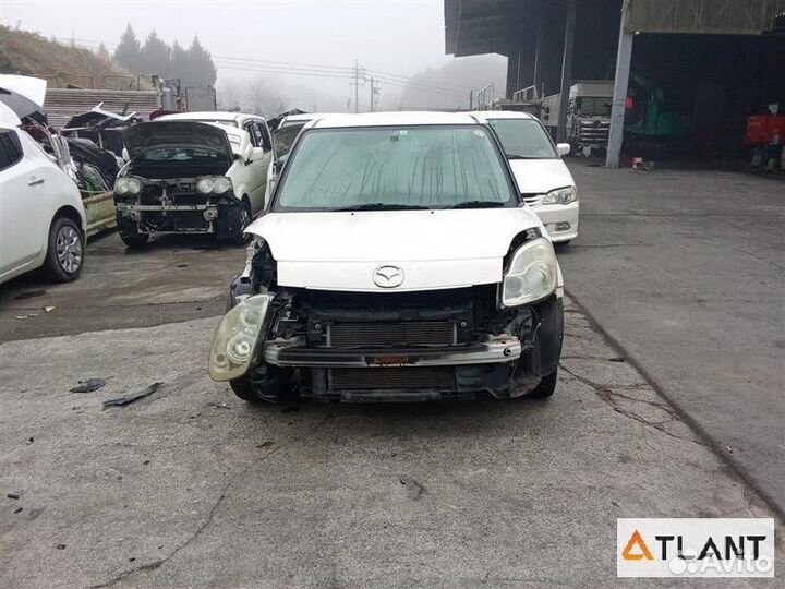 Обшивка дверей передний левый mazda verisa