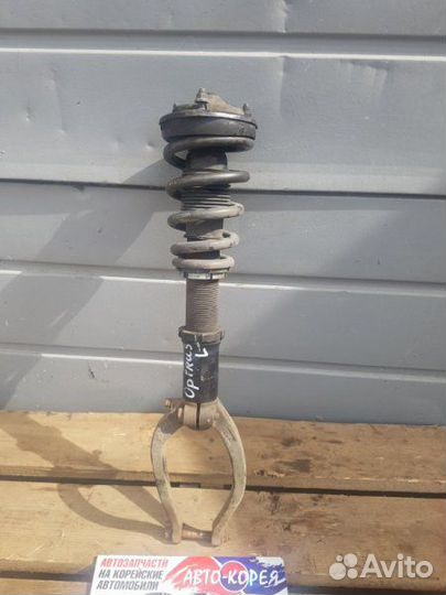 Стойка подвески передняя левая Kia Opirus G6CT