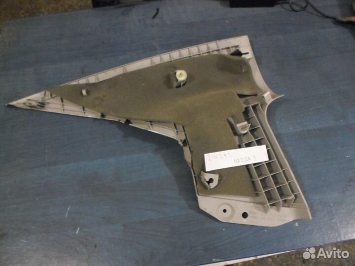 Обшивка стойки задней правой (Mazda 3)