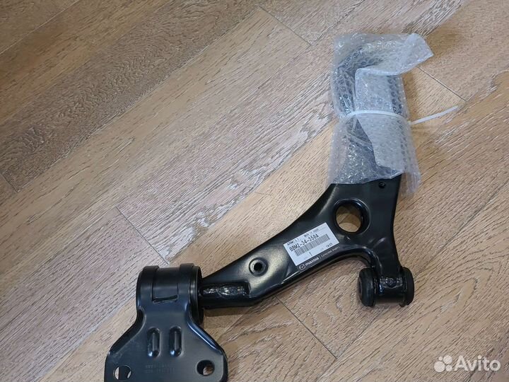 Рычаг левый мазда3