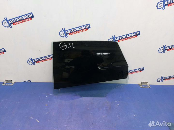 Стекло задней левой двери Opel Astra J 5D