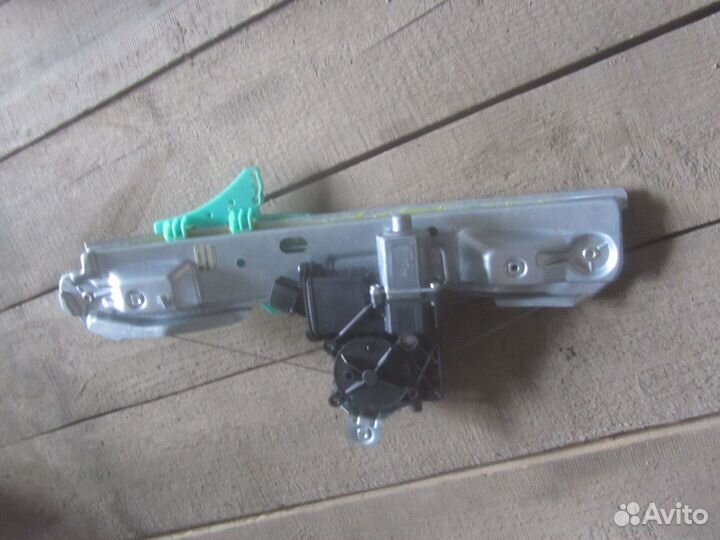 Стеклоподъемник электро задний левый Опель Астра J