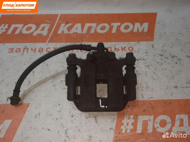 Суппорт тормозной задний левый Nissan X-Trail T31