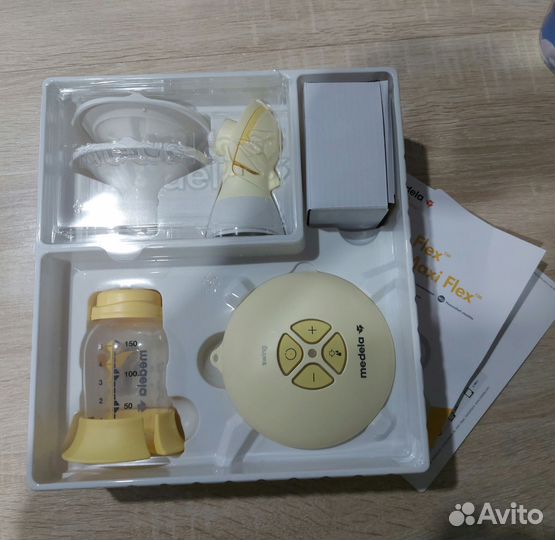 Молокоотсос medela swing flex электрический