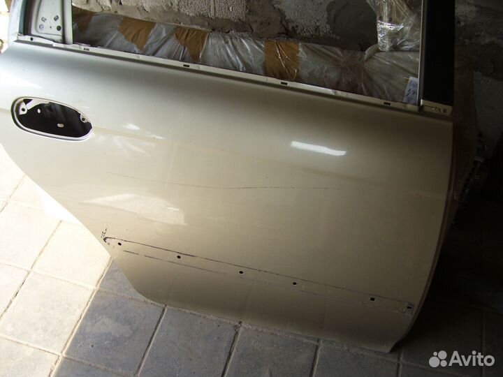 Киа спектра дверь задняя