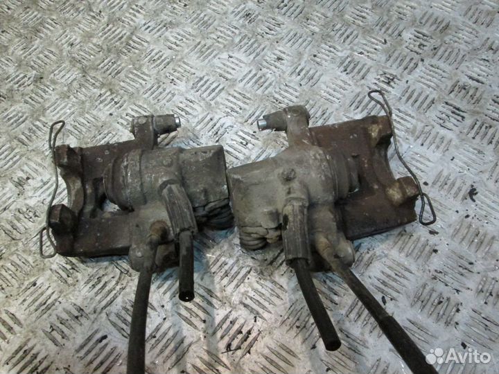 Суппорт тормозной задний для Мазда 3 бк бл