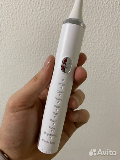 Электрическая зубная щетка