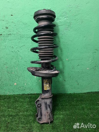 Стойка амортизатора передняя правая Opel Zafira C