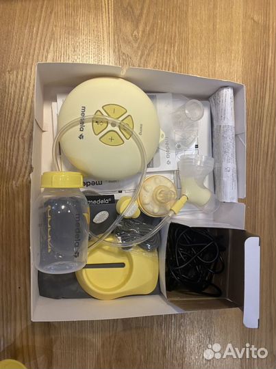 Электрический молокоотсос Medela