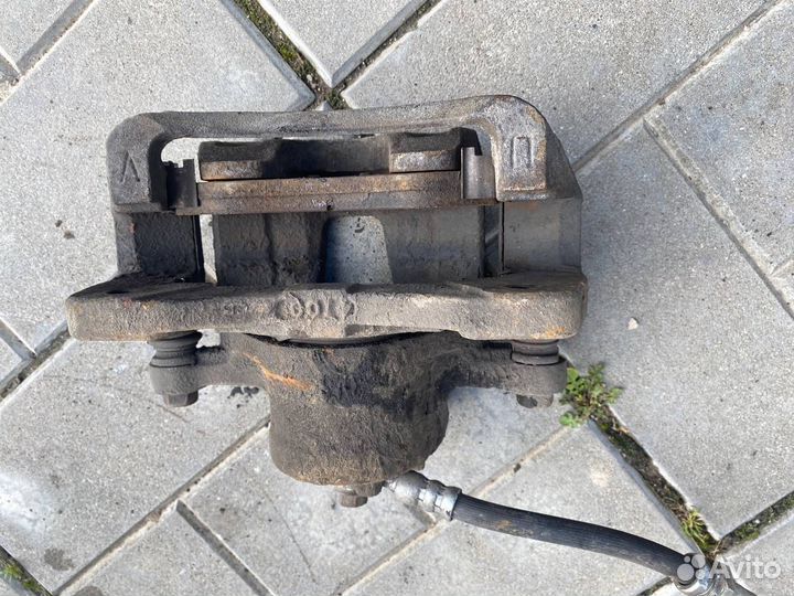 Тормозной суппорт передний левый Chevrolet Lacetti