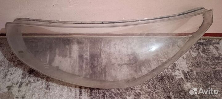 Стекло левого фара Hyundai Solaris 1. 2010.по14