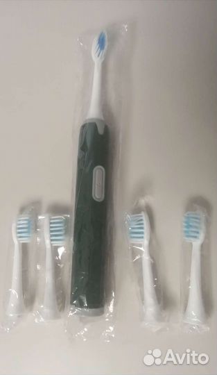 Электрическая зубная щетка