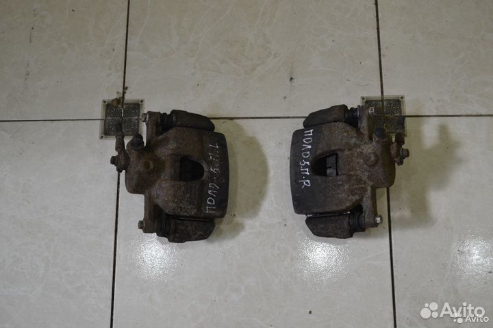 Тормозной суппорт передний правый Volkswagen Polo