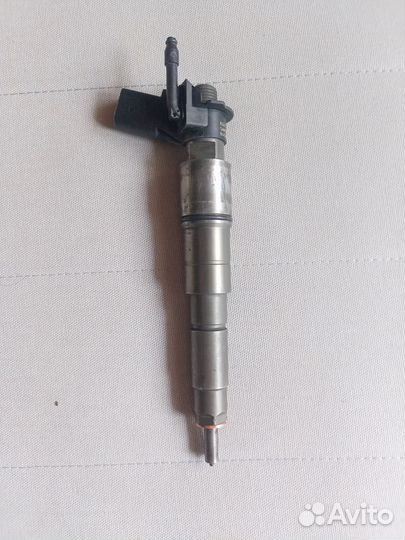 Форсунка топливная бмв. 0445115 077