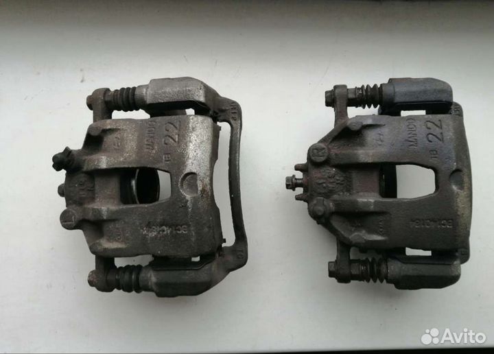 Передний правый суппорт Киа Рио 3