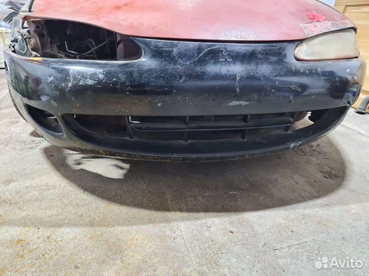 Передний бампер Mitsubishi Eclipse 2G дорест