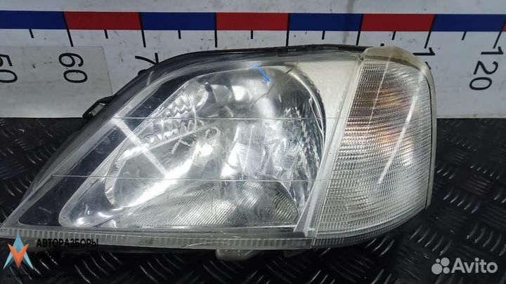 Фара левая Dacia Logan рест. 2008