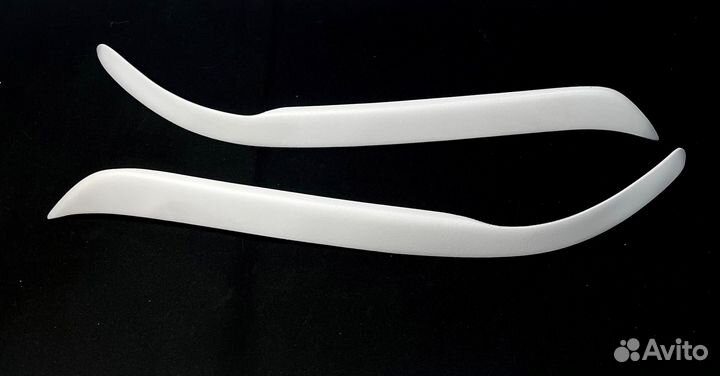 Реснички на фары mazda capella 1998