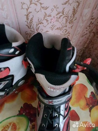 Роликовые коньки