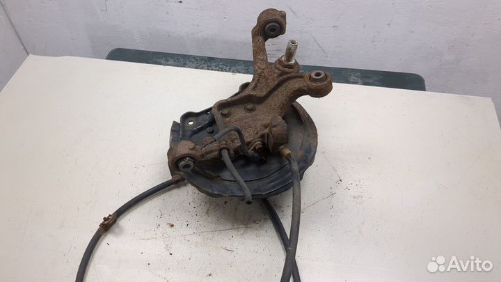 Ступица (кулак, цапфа) левая задняя Mitsubishi Galant