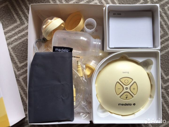 Молокоотсос medela swing