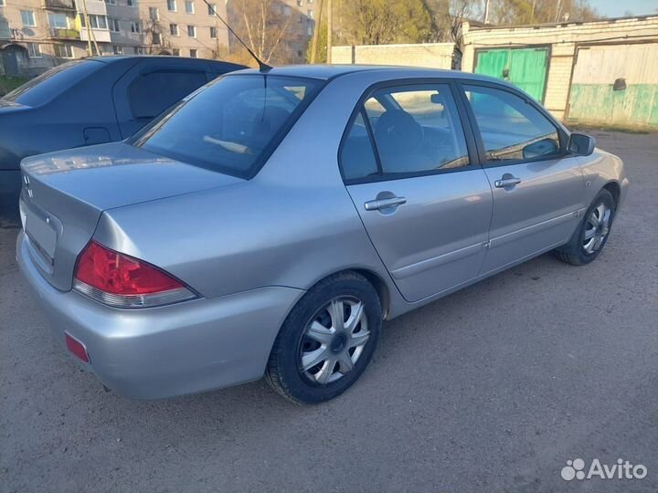 Mitsubishi Lancer 1.6 МТ, 2006, 219 500 км
